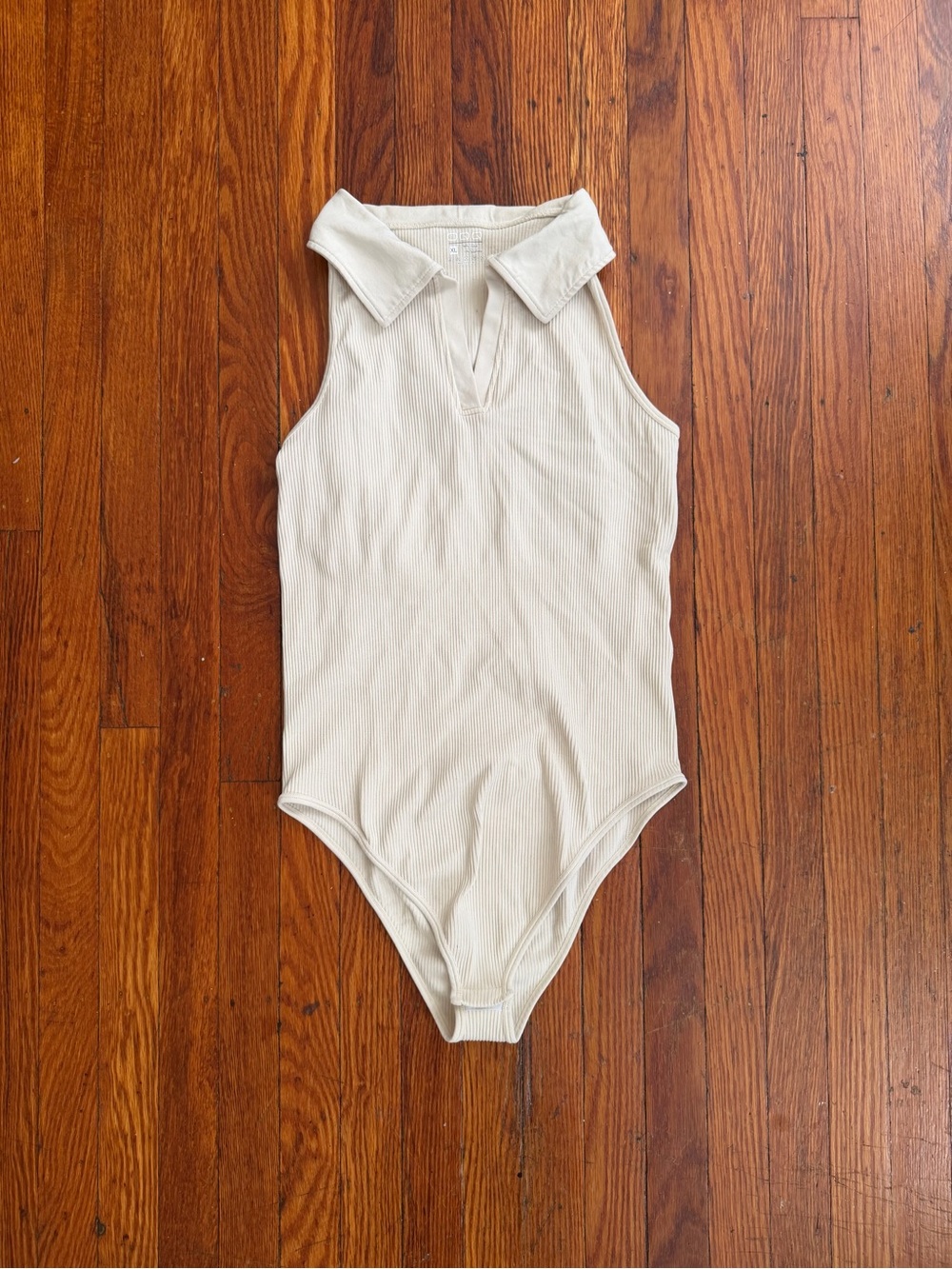 Ribbed One-Piece Bodysuit in Cream